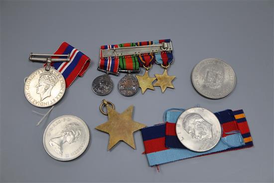 Two WW2 war medals, a bar of four miniatures and sundries